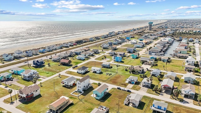 birds eye view of property with a water view and a residential view