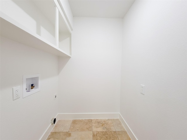 washroom featuring laundry area, hookup for an electric dryer, hookup for a washing machine, and baseboards