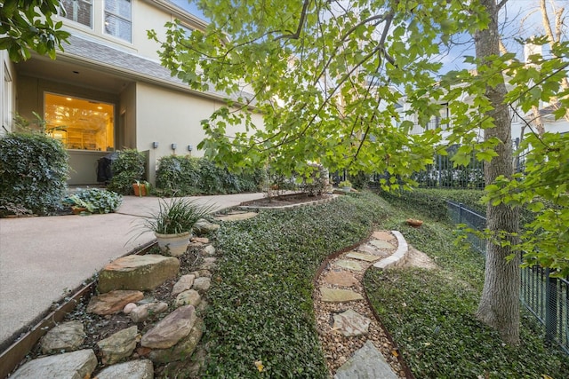 view of yard featuring a patio area and fence