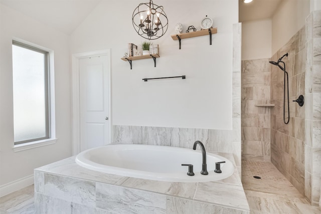 bathroom with baseboards, an inviting chandelier, vaulted ceiling, walk in shower, and a bath