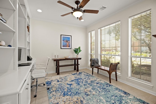 office with ornamental molding, ceiling fan, baseboards, and light tile patterned floors