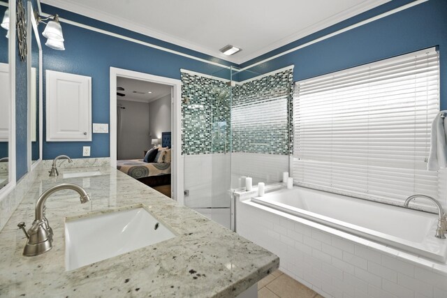 full bath featuring a stall shower, crown molding, a sink, and ensuite bathroom