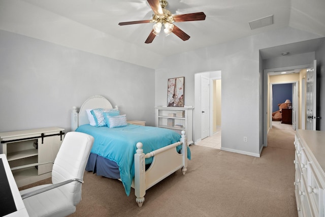 bedroom with light carpet, baseboards, visible vents, lofted ceiling, and ceiling fan