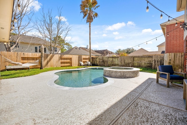 view of pool featuring a fenced in pool, a patio area, and a fenced backyard