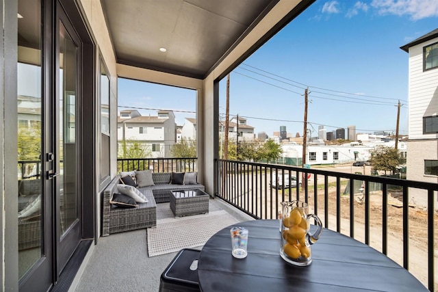 balcony with an outdoor hangout area