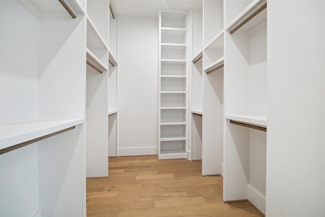 walk in closet featuring light wood-style floors