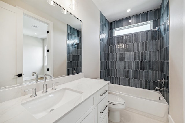 bathroom featuring recessed lighting, visible vents, toilet, vanity, and  shower combination