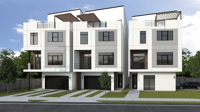 exterior space featuring driveway, an attached garage, fence, and stucco siding