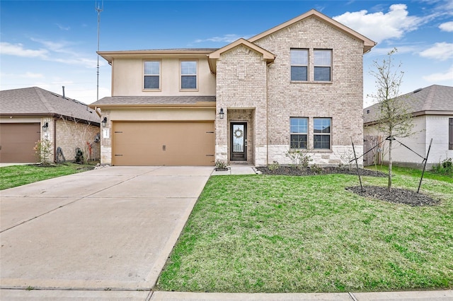 traditional-style house featuring brick siding, stucco siding, an attached garage, a front yard, and driveway