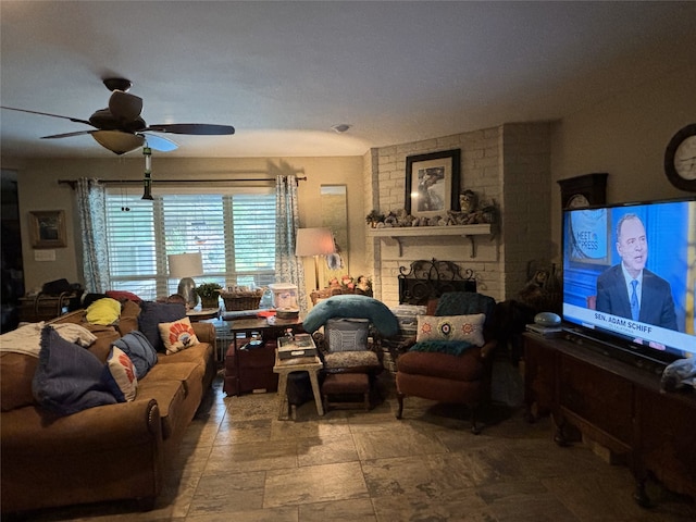 living room with stone finish floor and ceiling fan