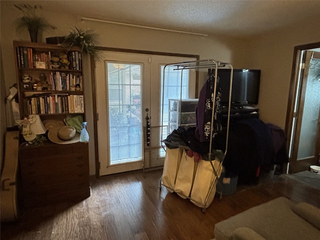 interior space featuring french doors and dark wood finished floors
