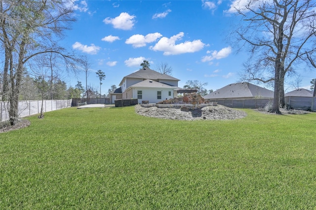 view of yard featuring a fenced backyard