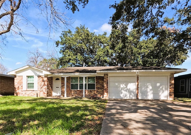 single story home featuring driveway, brick siding, an attached garage, and a front yard