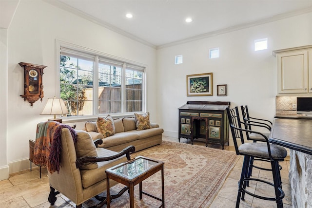 living room featuring ornamental molding, recessed lighting, stone finish floor, and baseboards