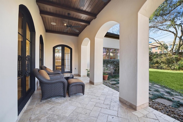 view of patio with a ceiling fan and french doors