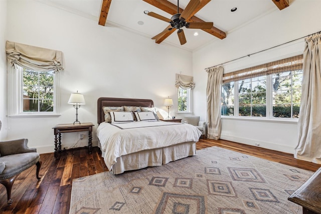 bedroom featuring dark wood-style floors, recessed lighting, beam ceiling, and baseboards