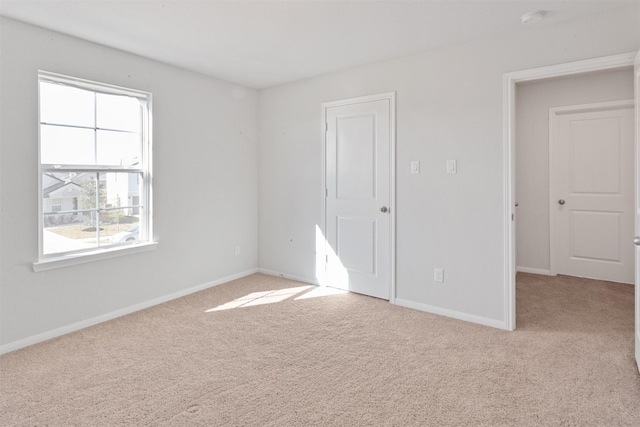 2533 Allegretto Sea Dr, Katy, TX 77493 - unfurnished bedroom featuring light carpet and baseboards