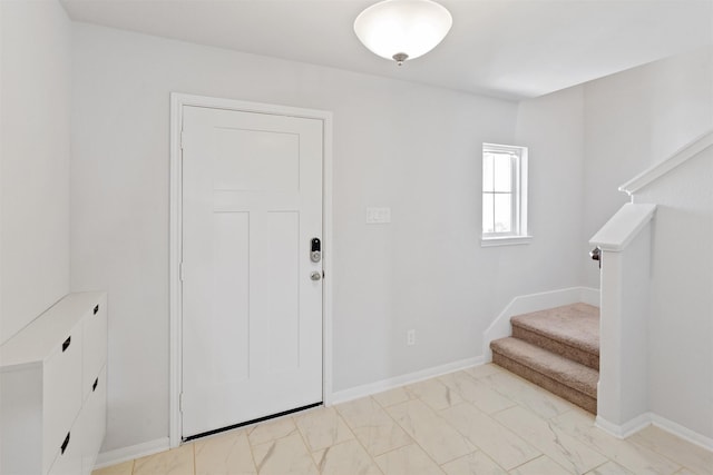 2533 Allegretto Sea Dr, Katy, TX 77493 - entryway featuring marble finish floor, baseboards, and stairs