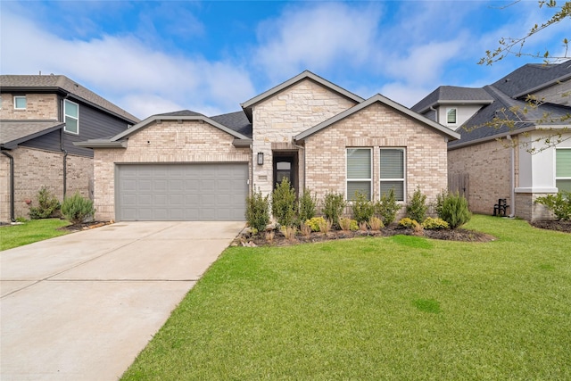 view of front facade with an attached garage, brick siding, concrete driveway, stone siding, and a front yard