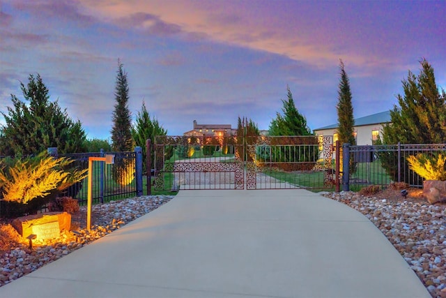 view of gate with fence