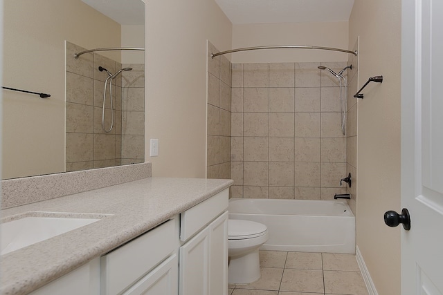 full bathroom with baseboards, toilet, tile patterned flooring, vanity, and washtub / shower combination