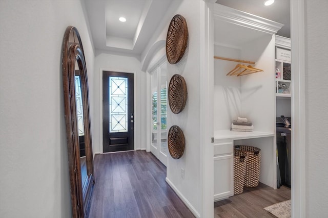 entrance foyer featuring baseboards, dark wood-type flooring, and recessed lighting