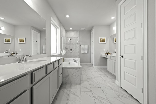 bathroom with recessed lighting, baseboards, marble finish floor, a bath, and a stall shower