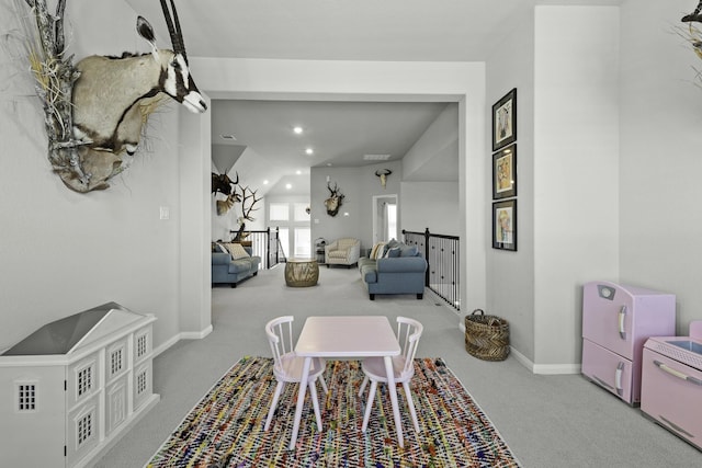 carpeted dining space featuring baseboards and recessed lighting