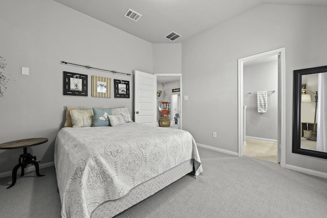 carpeted bedroom featuring lofted ceiling, visible vents, and baseboards