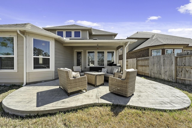 view of patio with outdoor lounge area and fence