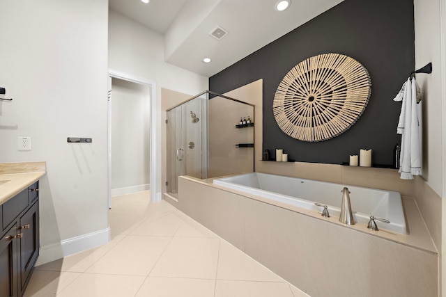 bathroom with visible vents, a shower stall, a bath, baseboards, and tile patterned floors