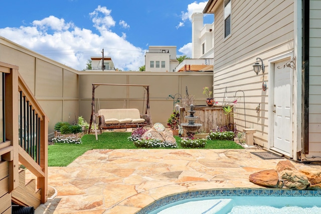 view of patio / terrace with fence