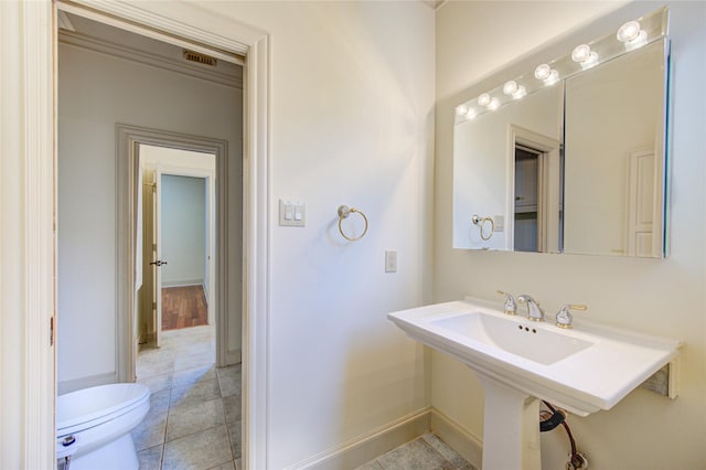 122 Vieux Carre Dr, Houston, TX 77009 - bathroom with toilet and baseboards
