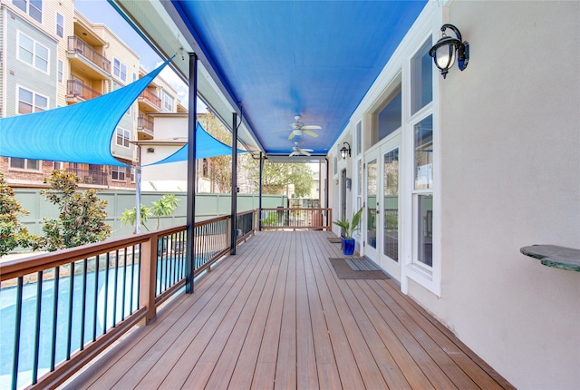122 Vieux Carre Dr, Houston, TX 77009 - wooden deck with ceiling fan and french doors