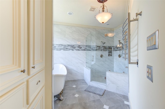 122 Vieux Carre Dr, Houston, TX 77009 - full bathroom featuring a soaking tub, a shower stall, and tile patterned flooring