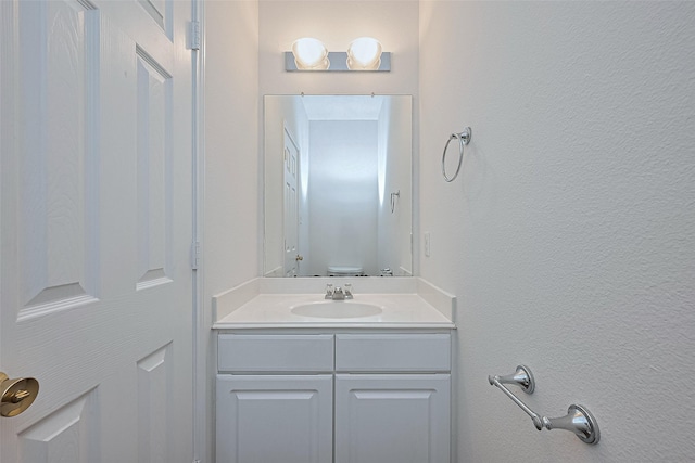 9514 Barr Spring Dr, Humble, TX 77396 - bathroom featuring toilet and vanity