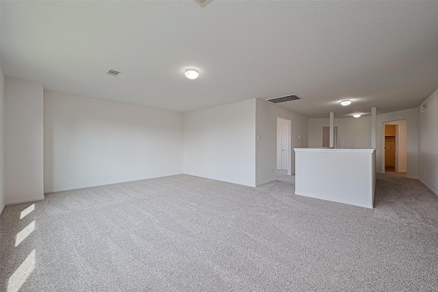 9514 Barr Spring Dr, Humble, TX 77396 - unfurnished room featuring light carpet and baseboards