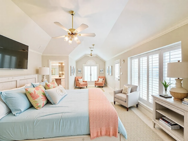 bedroom featuring a ceiling fan, baseboards, ensuite bathroom, lofted ceiling, and ornamental molding