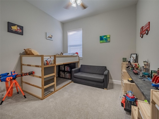 bedroom featuring carpet, baseboards, and ceiling fan