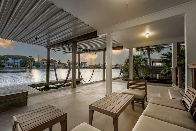 view of patio featuring a water view and an outdoor hangout area