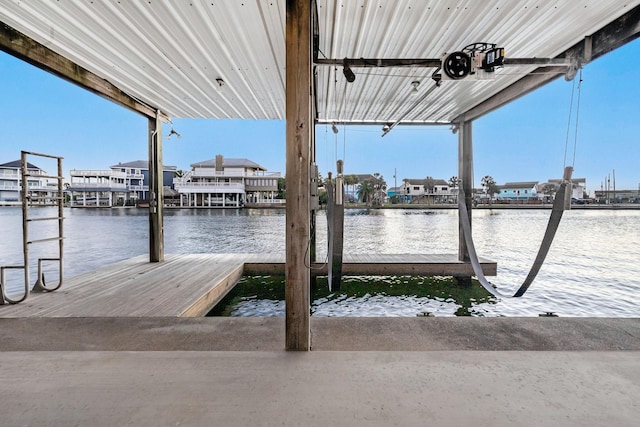 view of dock with a water view