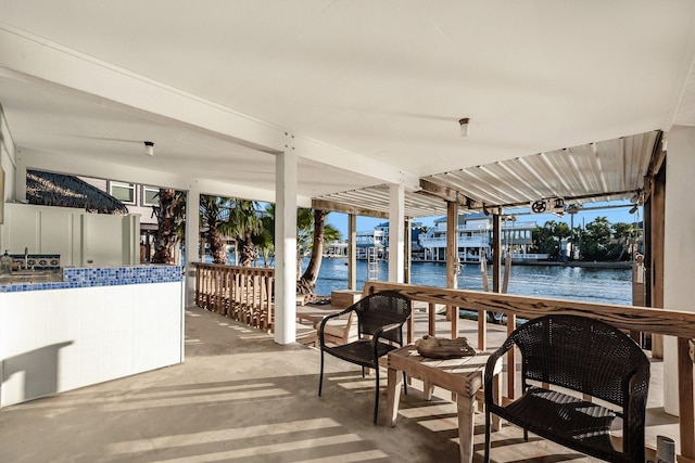 view of patio / terrace featuring a water view