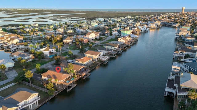 bird's eye view featuring a residential view and a water view