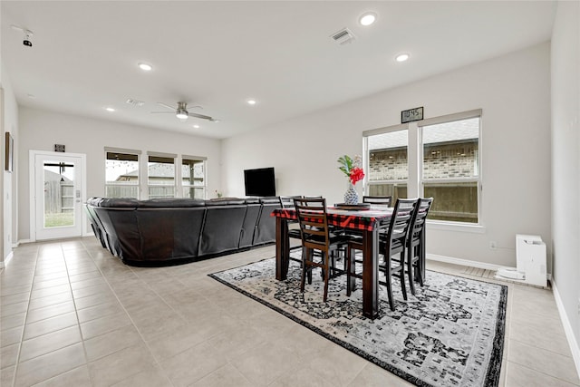 dining space with baseboards, light tile patterned floors, visible vents, and recessed lighting