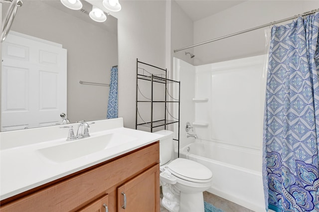 full bath with shower / bathtub combination with curtain, vanity, and toilet