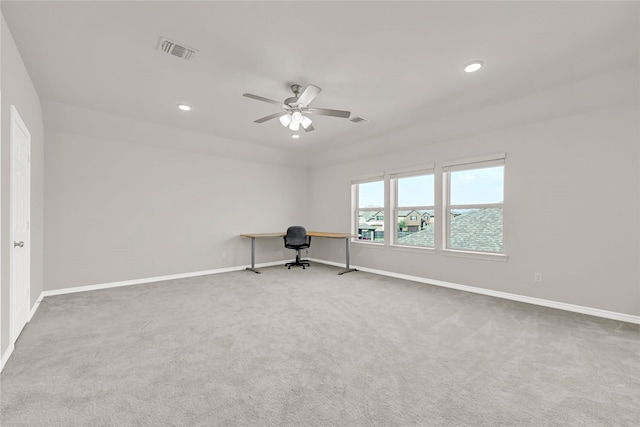 spare room featuring carpet floors, baseboards, visible vents, and recessed lighting