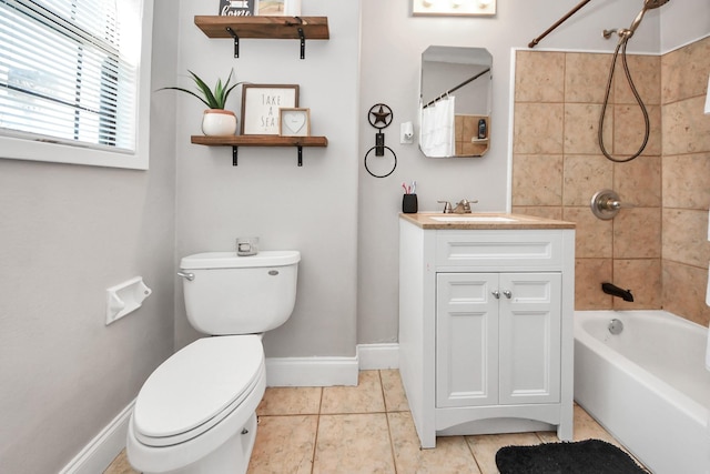 full bath featuring shower / bath combo, vanity, toilet, and baseboards