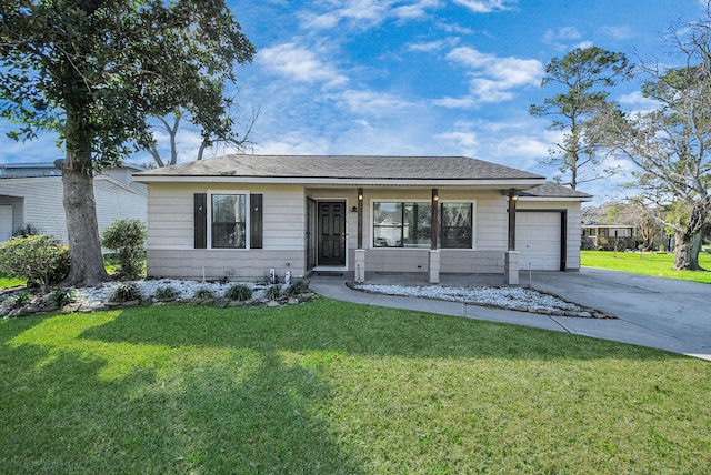 ranch-style house featuring driveway, an attached garage, and a front lawn