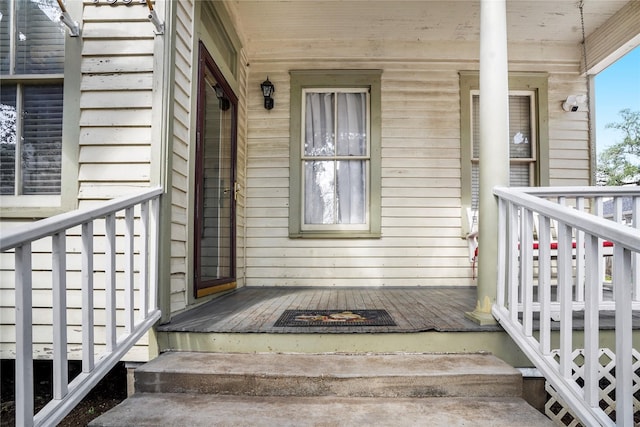 doorway to property with covered porch