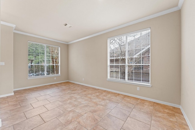 spare room featuring light tile patterned floors, baseboards, visible vents, and ornamental molding